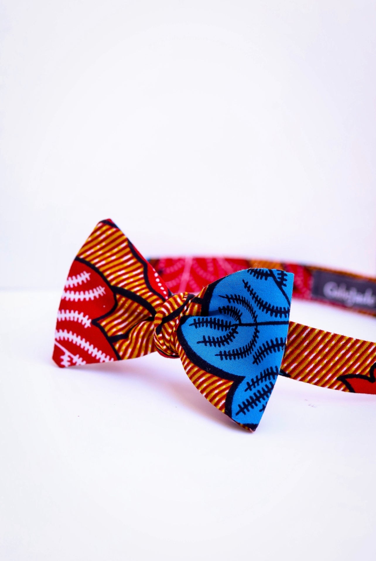 "African print self-tie bowtie showcasing vibrant traditional patterns and colors"